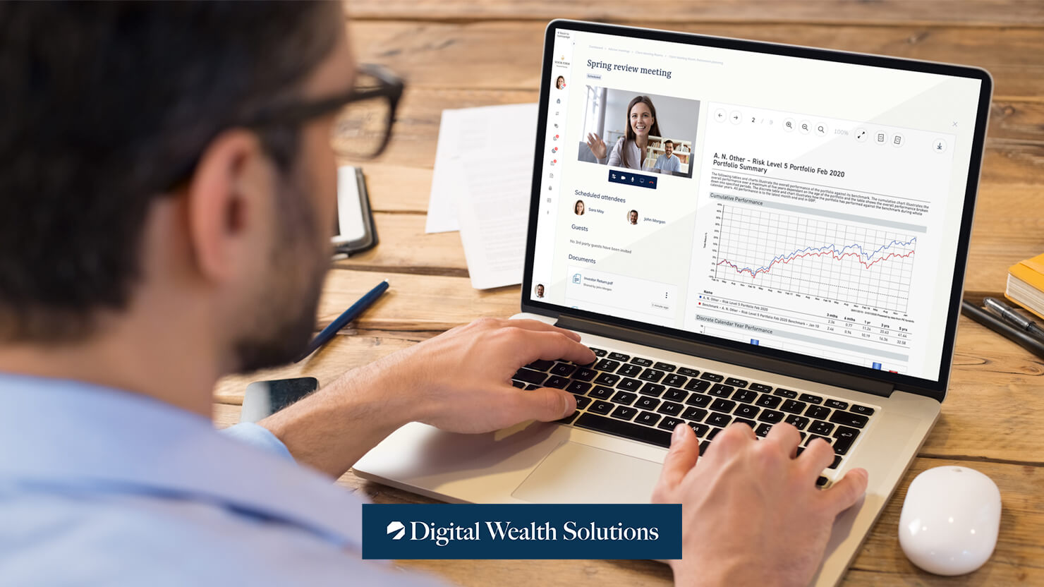 man sitting in front of computer